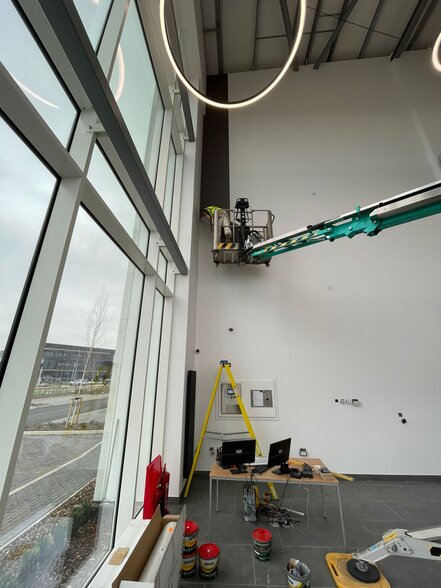 Feature wall mural aligned across panels