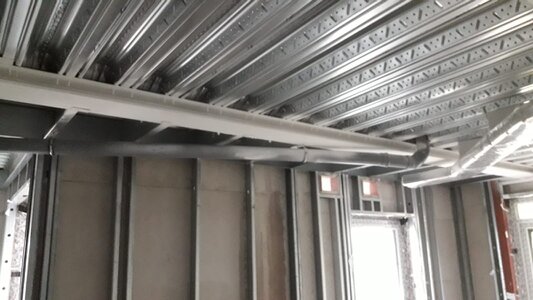 Steel beam being coated